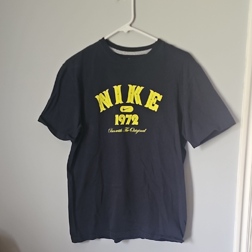 Nike Men's Navy T-Shirt with Yellow Logo